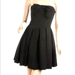 A/X Armani Exchange black taffeta strapless dress.
Size 4
C